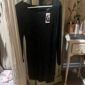 A black sequence cocktail dress